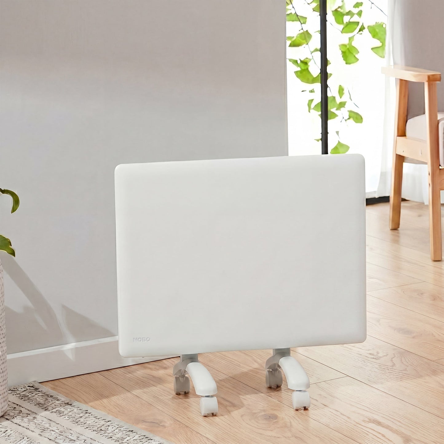 Nobo 1000W Compact Electric Panel Heater with Castors & Wall Mount - Refurbished